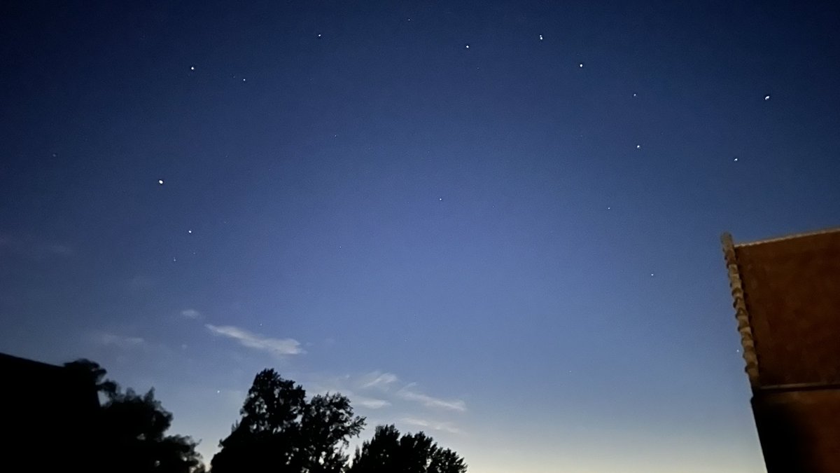 One more from this perfect late summer night in Norfolk: the Plough forming a halo of stars in the clearing sky as the lights fade.