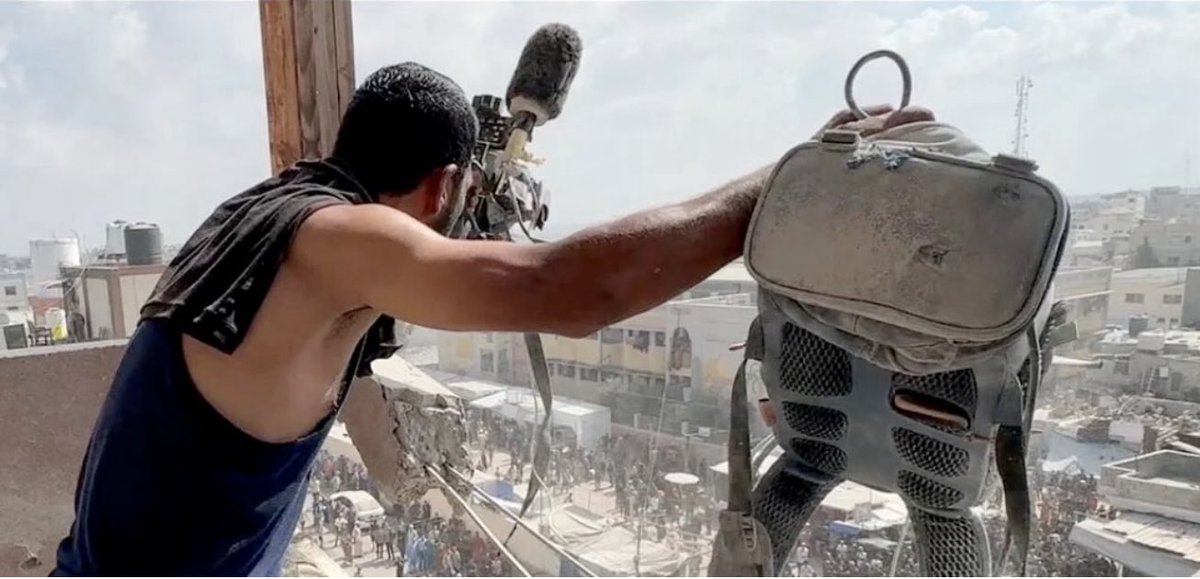 Just getting this devastating story of this photo:

This man is named Abdullah Amer. After Israel assassinated Rueters’ cameraman, Hossam al-Masri, Abdullah hurried to the scene. He held Hossam’s camera and vest. A few moments later, Israel struck the place again, killing