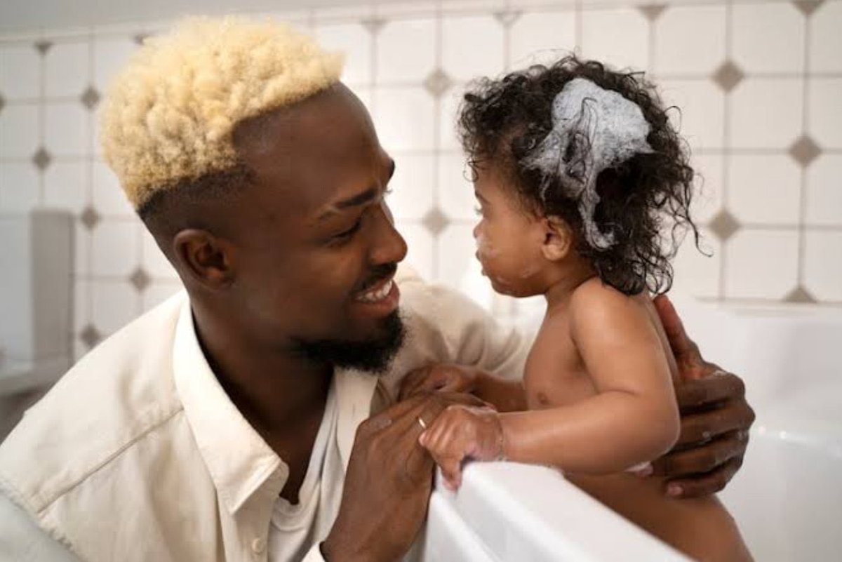 Mikel Obi and two months old Rio Ngumoha, Ilorin 2004.