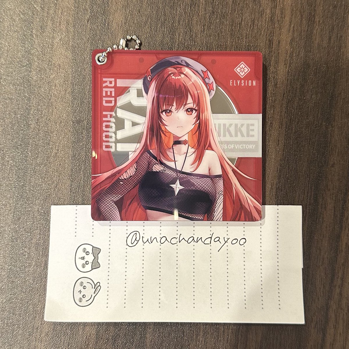 【交換】
勝利の女神：NIKKE LAWSON スライドミラーキーホルダー 

譲： ラピ

求：黒紅蓮

お気軽にお声掛けください🐰