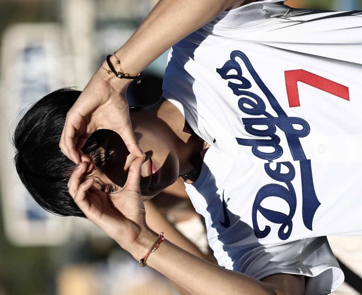 kim taehyung is glowing in his dodgers 7 jersey