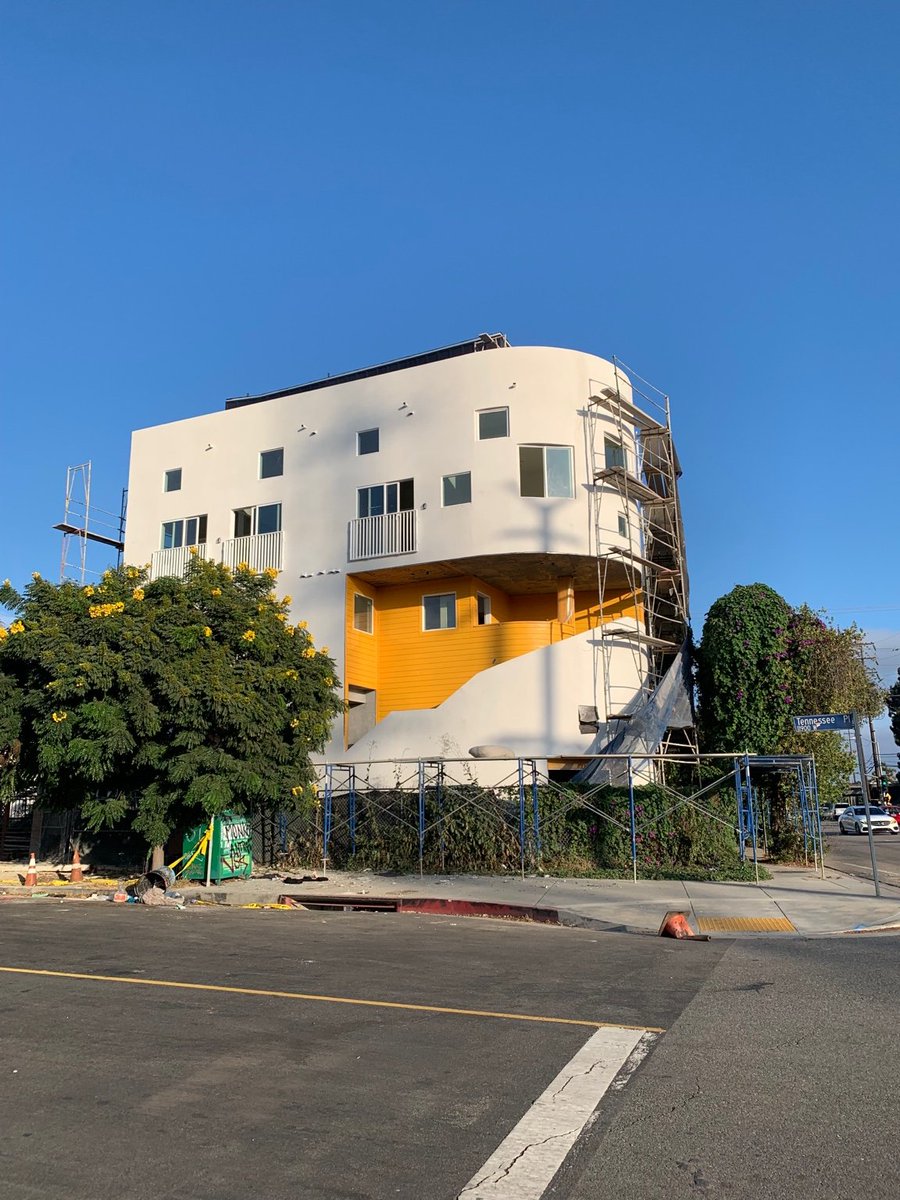 New Bundy/Expo build finally getting (partially) unwrapped.

It broke ground ~2 years ago, but it's still a ways from opening. Was submitted as a "duplex" but has multiple rec rooms which will become units + ground floor retail.  

Also: it had to pay 200k in linkage fees!