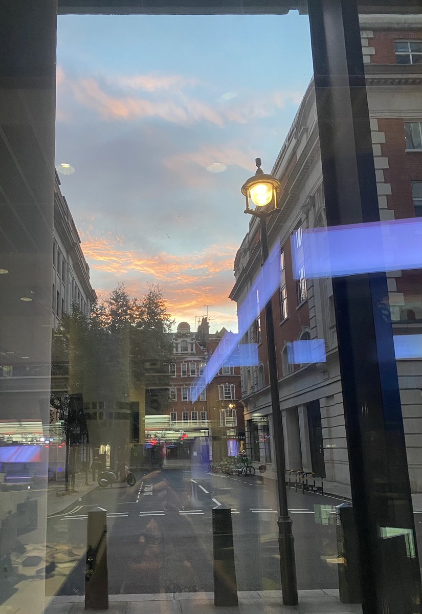 Dawn from inside the glass box of news