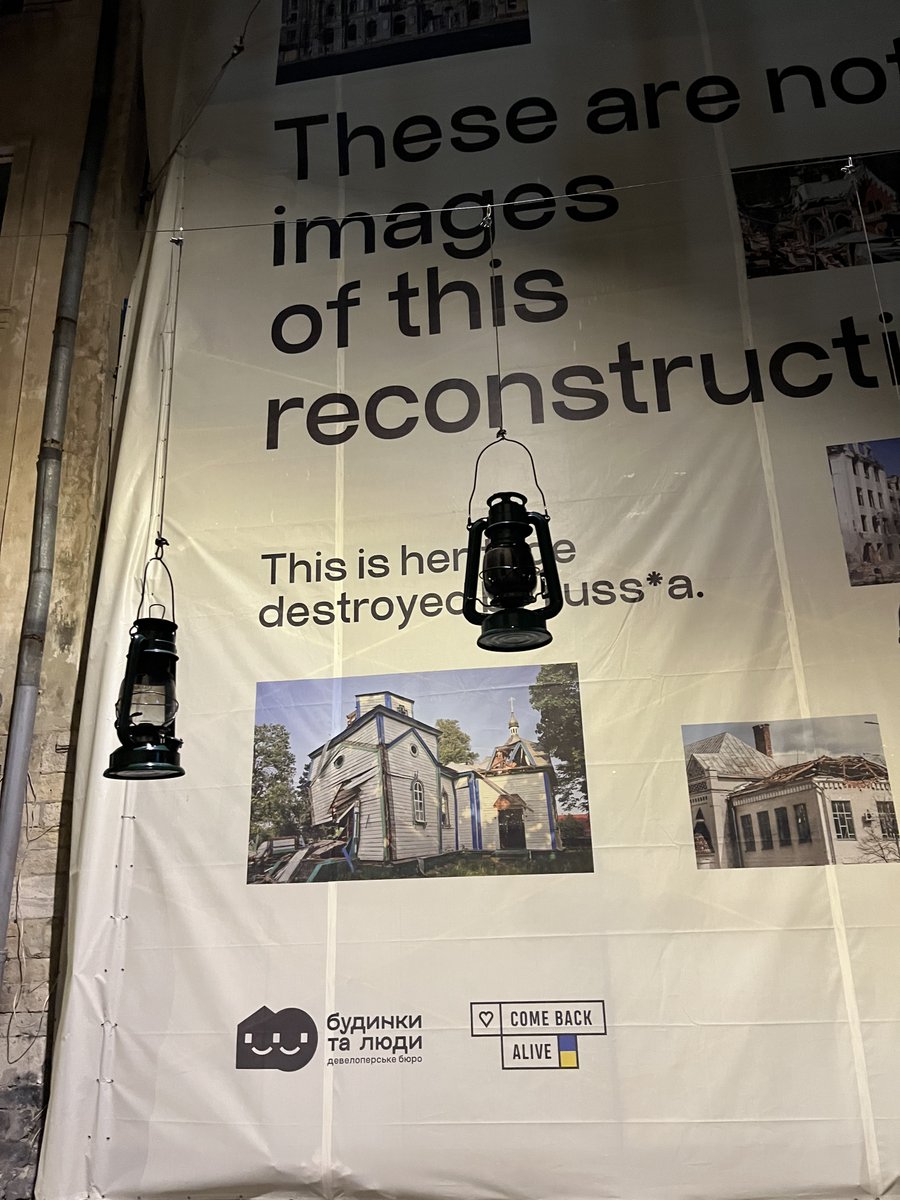 'These are not images of this reconstruction': renovation work in Lviv's old town confronts passers-by with a street screen showing the aggressor's destruction of #Ukrainian built heritage.