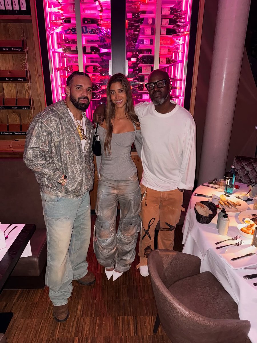 HotTopicsMzansi's tweet photo. Black Coffee and his girlfriend pictured together with Drake. https://t.co/pnpzGXuGp6
