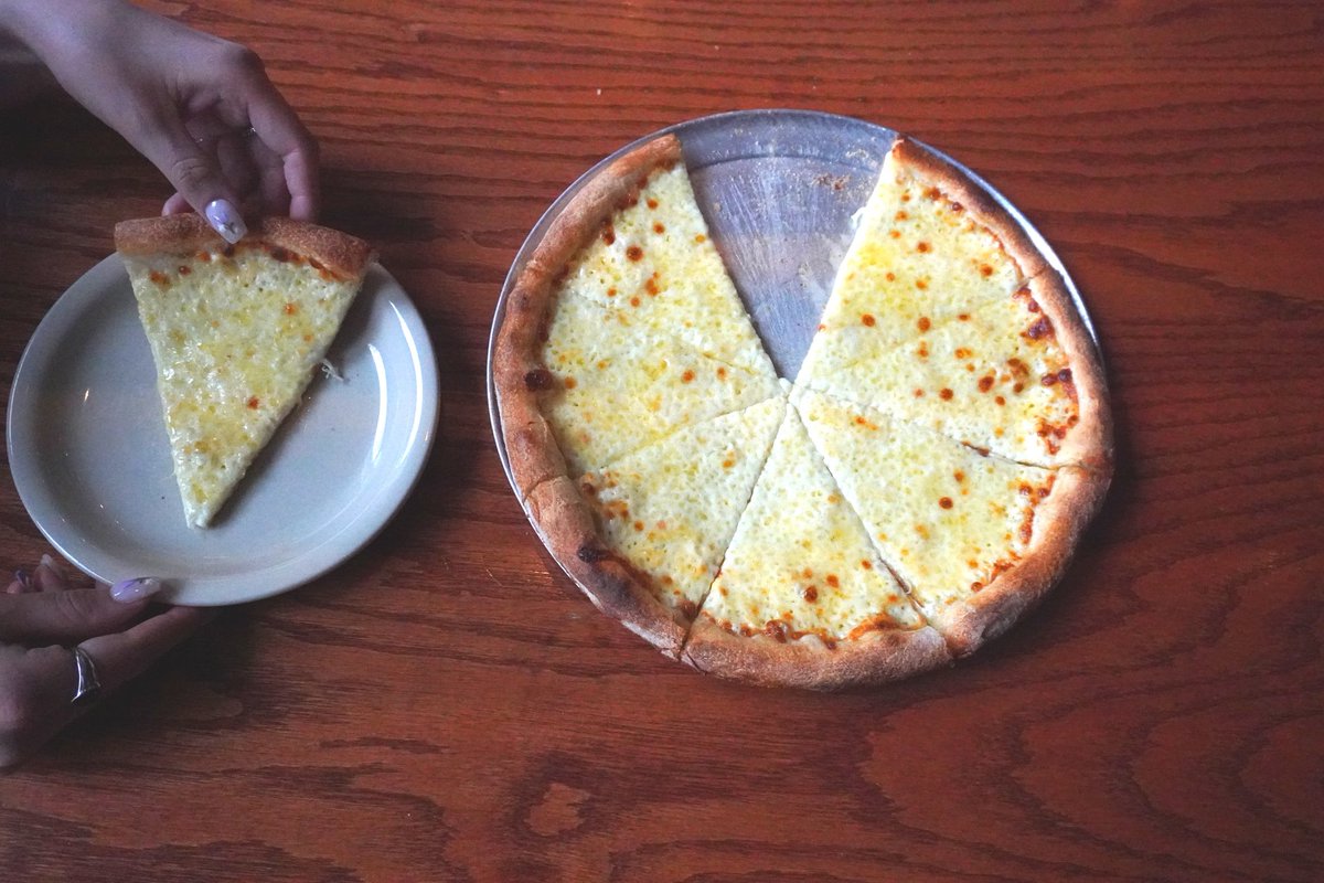 Simple. Cheesy. Perfect. 🍕 Every pizza is a win here! 

#misconducttavern #philly #cheesepizza #pizza #pizzalover #phillysports #thingstodo #gamedayeats #phillyeats