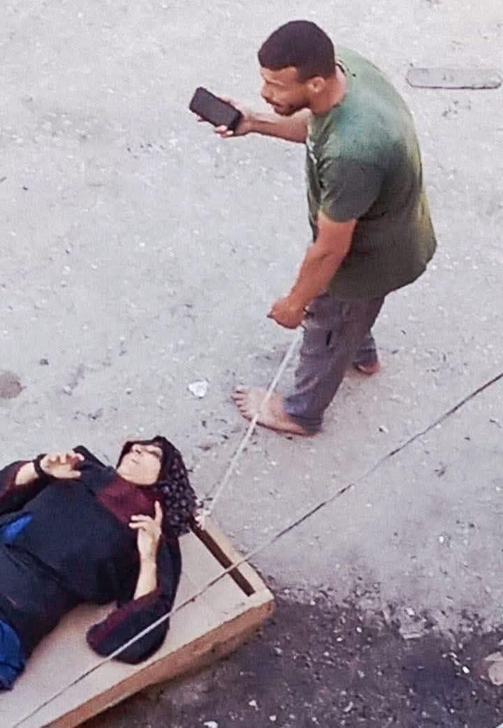 🚨BREAKING/HORRIBLE: In Gaza, Samia Shahin went with her young son to bake bread when an Israeli tank opened fire. 

Her little boy Ahmed raised his hands to show they were civilians, yet both were killed. Attempts to evacuate her on a cart failed.

 In recent weeks, she had