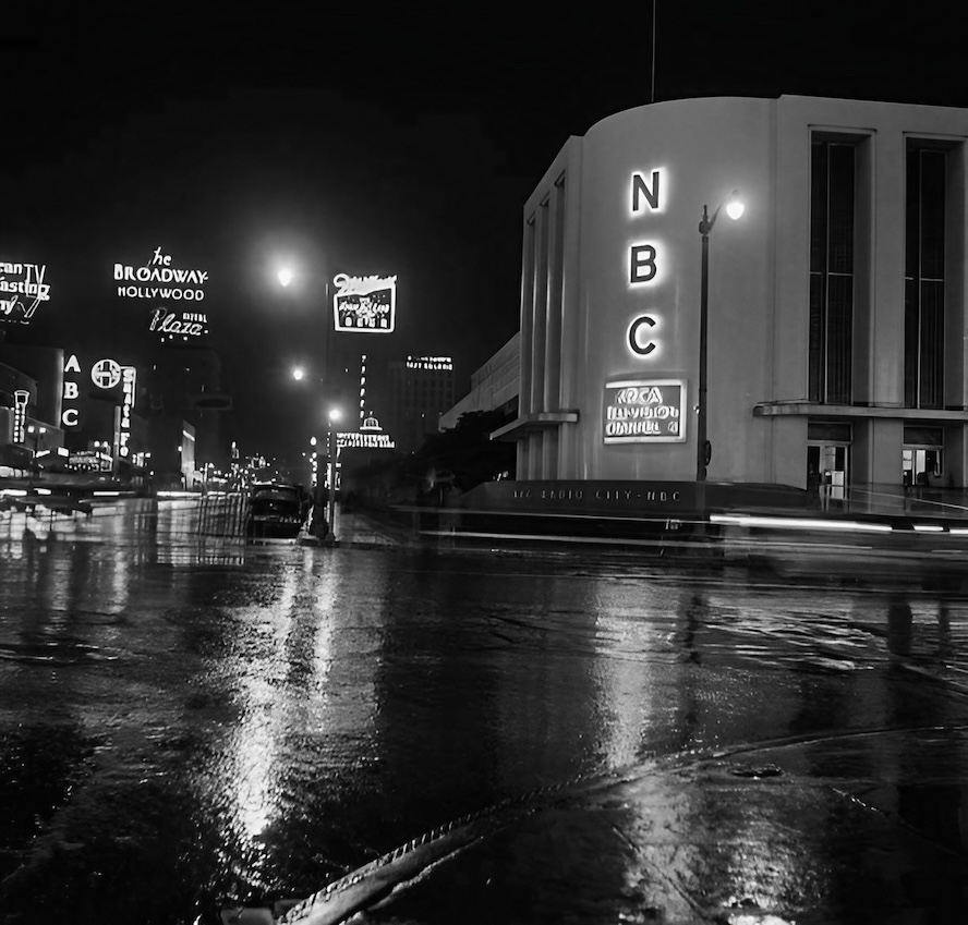 There is something about the combination of Sunset Blvd + Hollywood + nighttime + rain that makes for an irresistibly atmospheric combo. The photographer was standing on the southeast corner of Sunset and Vine, looking north past the NBC television studios in 1951.
