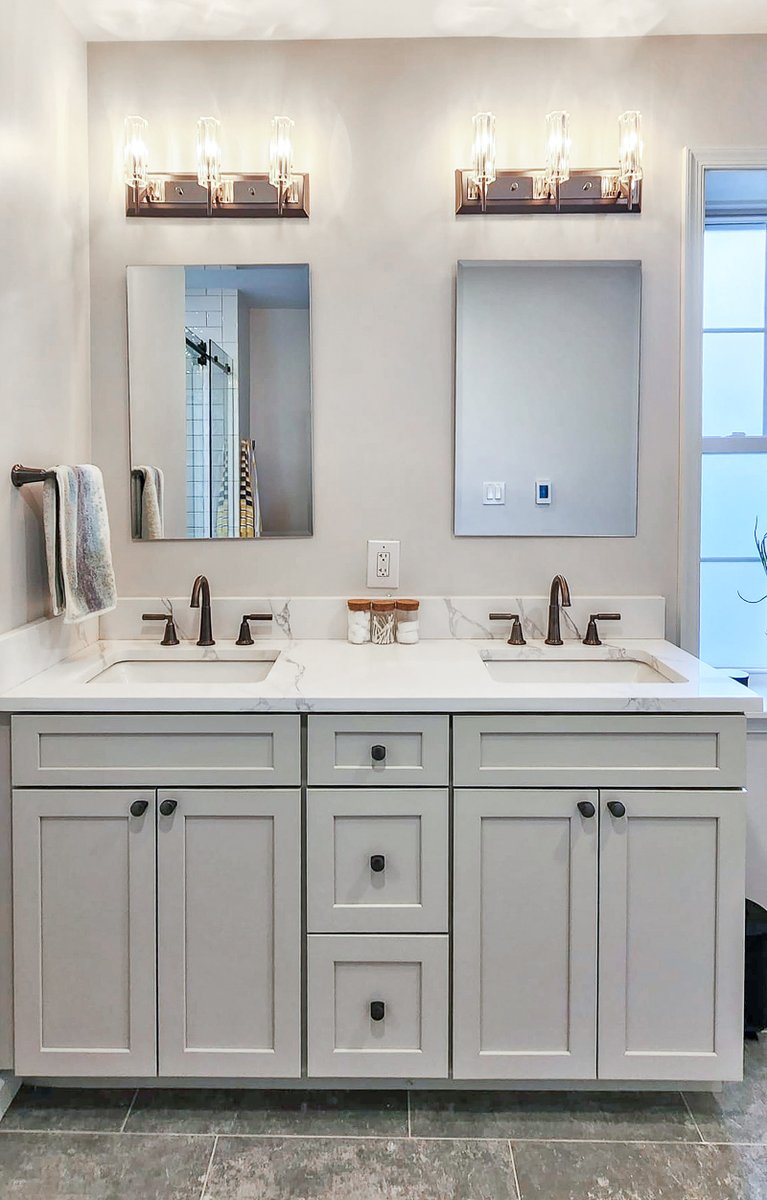 Classic charm meets modern comfort in this Philly bathroom remodel 🛁✨ A Harbor vanity with quartz counters, clawfoot tub, heated floors &amp; elegant tile bring timeless style + everyday luxury. Designed &amp; built by our in-house team. #bathroomremodel #phillyremodeling