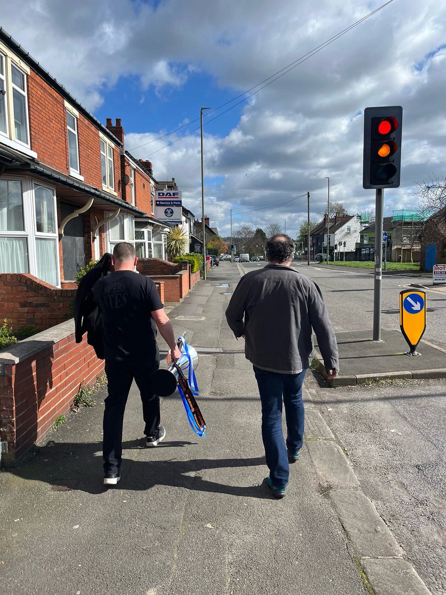 Just two brothers strolling down Brampton with a bit of silverware.