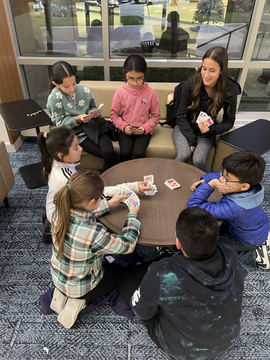 Cards, laughter, and good vibes with our mentors! 🃏 😀