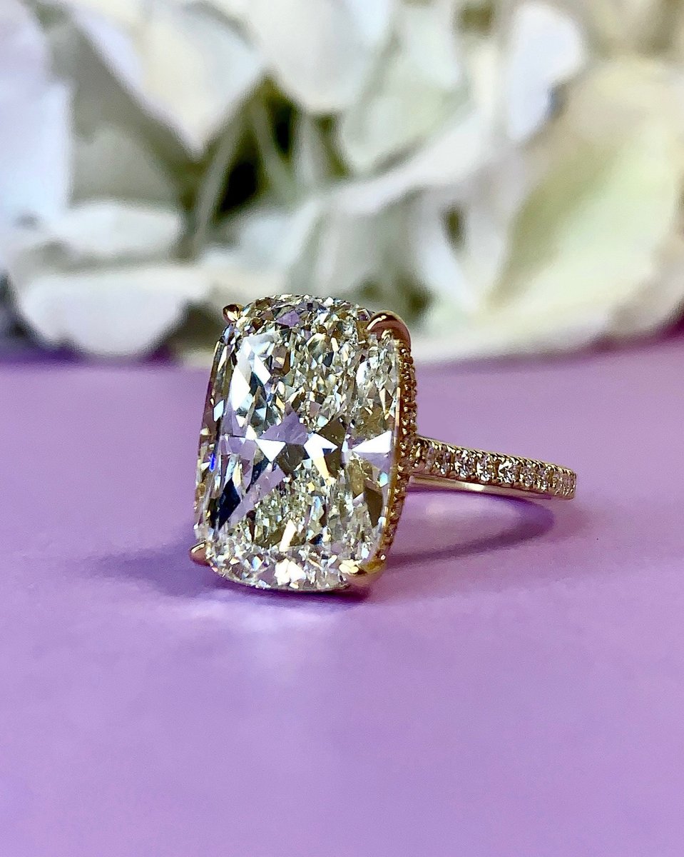 We’re swooning over Taylor Swift’s new engagement ring that features an estimated 10-carat elongated cushion cut diamond in yellow gold.

If you’re dreaming of a similar ring, pictured is a cushion cut beauty we recently had in stock to inspire you!

#taylorswiftengagementring