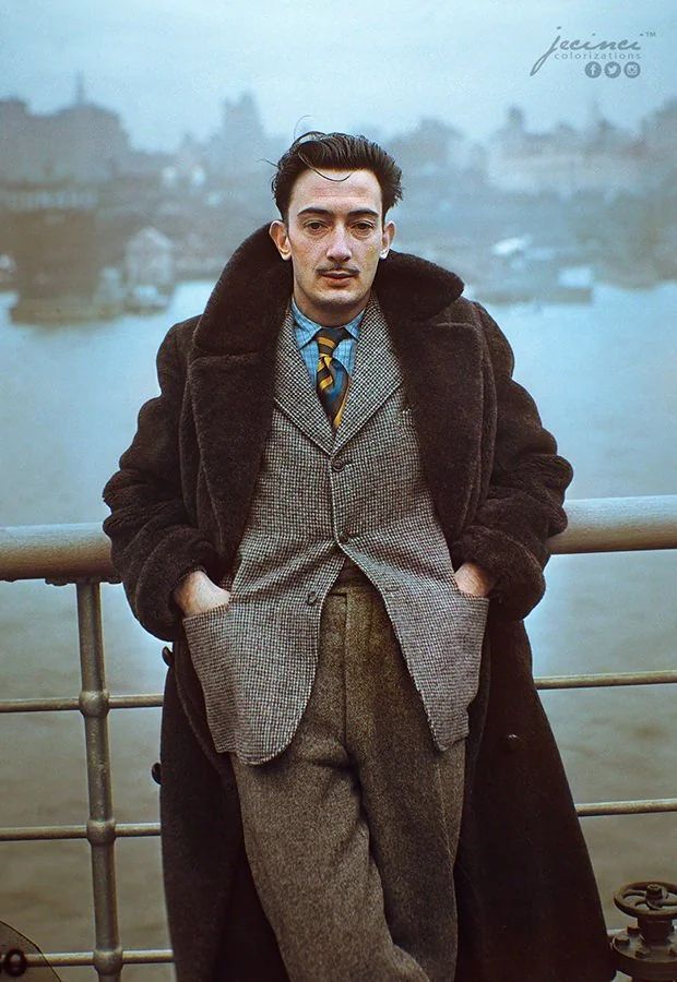 Salvador Dali standing on the deck of the S.S. Normandie as it docks in New York City - 1936. Color by Jecinci