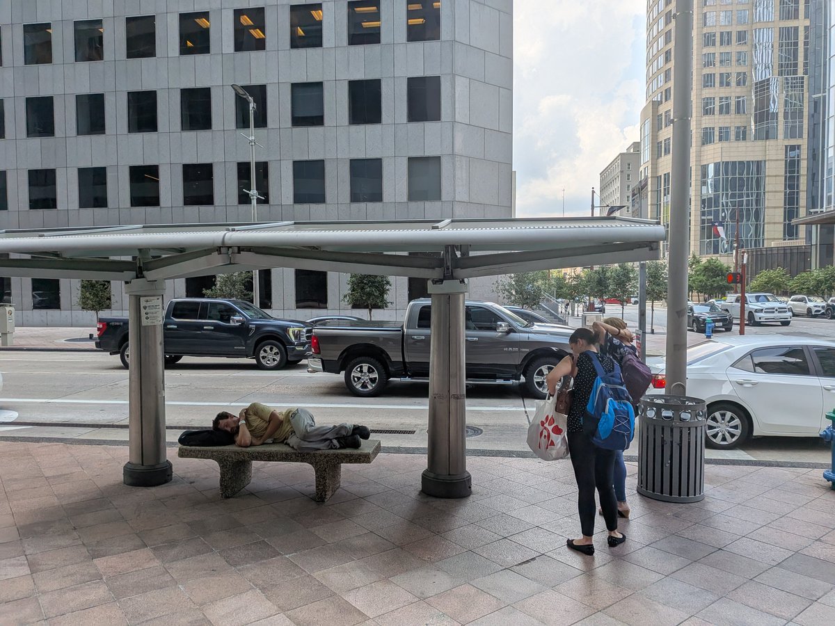 rbkdata's tweet photo. Bus stop 666 Travis and Texas downtown at 1507.  Bus riders keeping their distance and unable to sit down. https://t.co/BMxbBZ9qxl