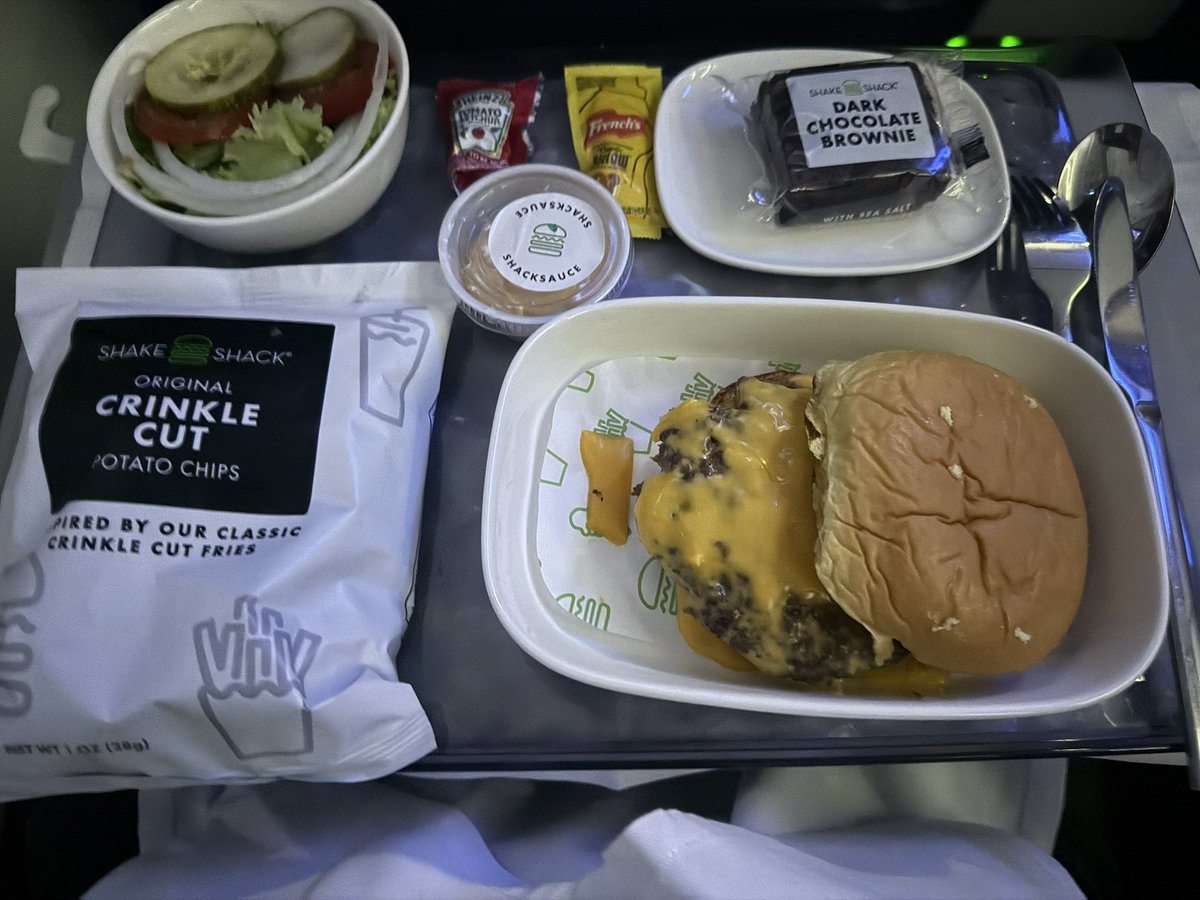 30th wedding anniversary spent on <a href="/Delta/">Delta</a> enjoying a <a href="/shakeshack/">SHAKE SHACK</a> burger with my wife.  Someone finally found a way to make a tasty meal on on a plane.  I’m shocked, happy, and full!  <a href="/dhmeyer/">Danny Meyer</a> somehow makes magic happen in the air.