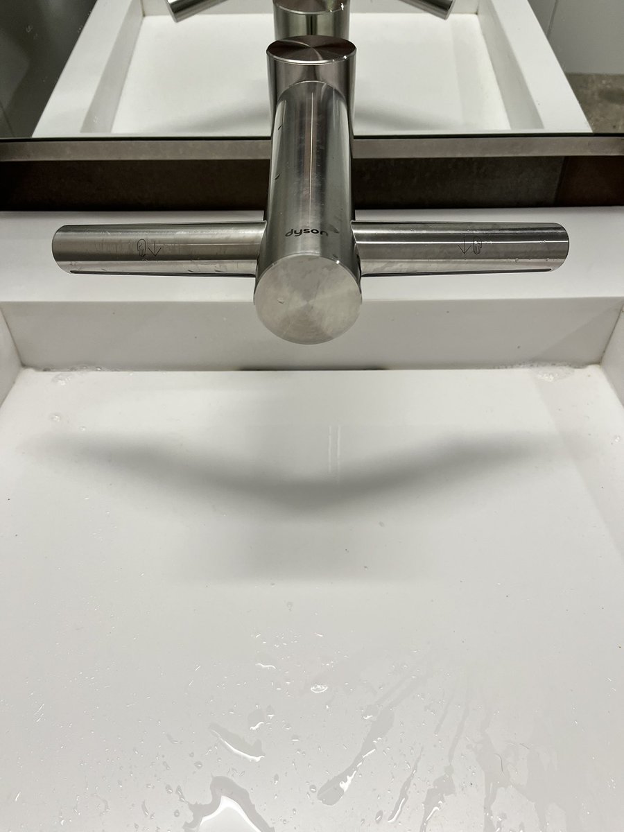 what kind of design is this.. you put your hands underneath to dry but there’s so much power that it blows water back at you so your hands are stuck in an ouroboros of wetness ☠️