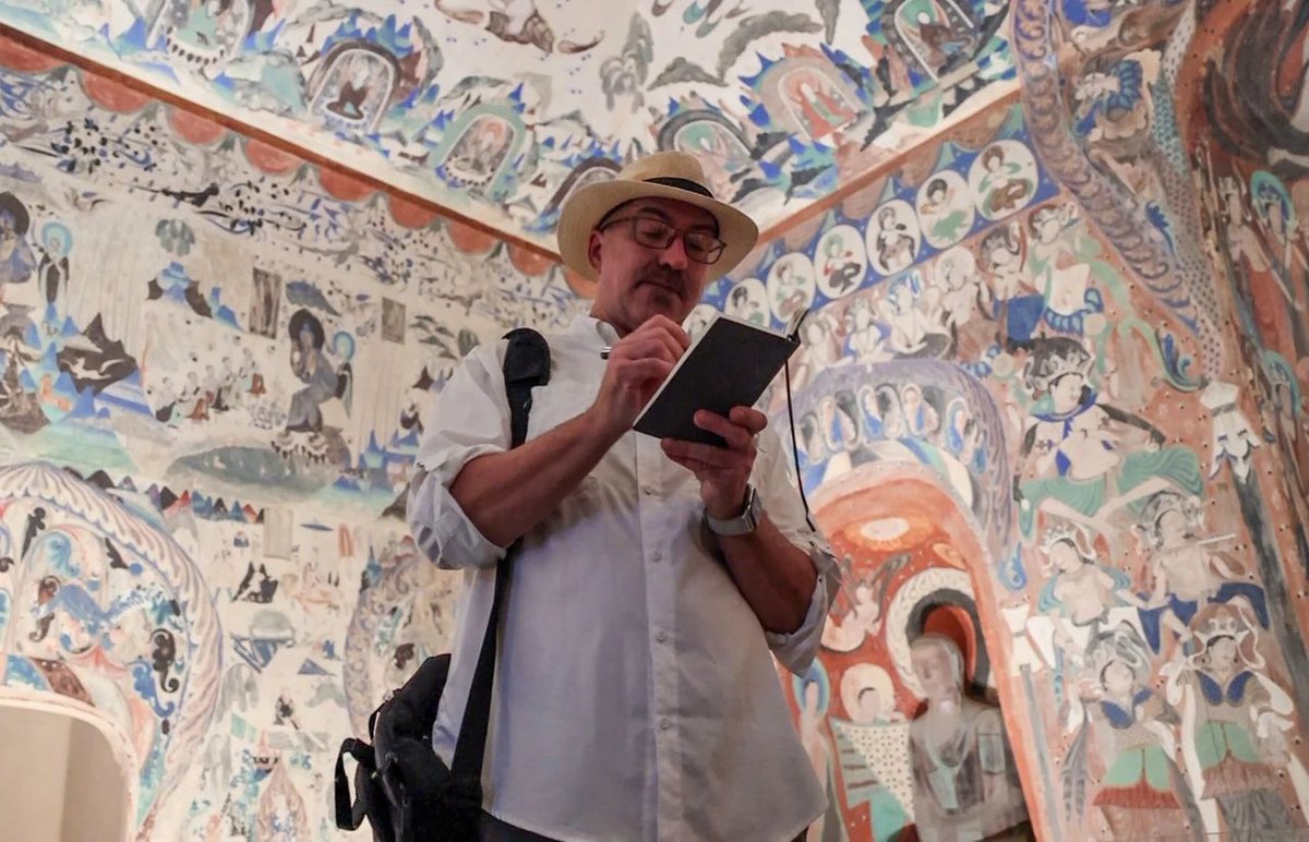 When American sinologist Neil Schmid first set foot in the Mogao Caves in Dunhuang, Gansu province in 1987, he was amazed by the seamless blend of local cultures. Now, he is the first full-time foreign researcher at the Dunhuang Academy. Neil is deeply passionate about sharing