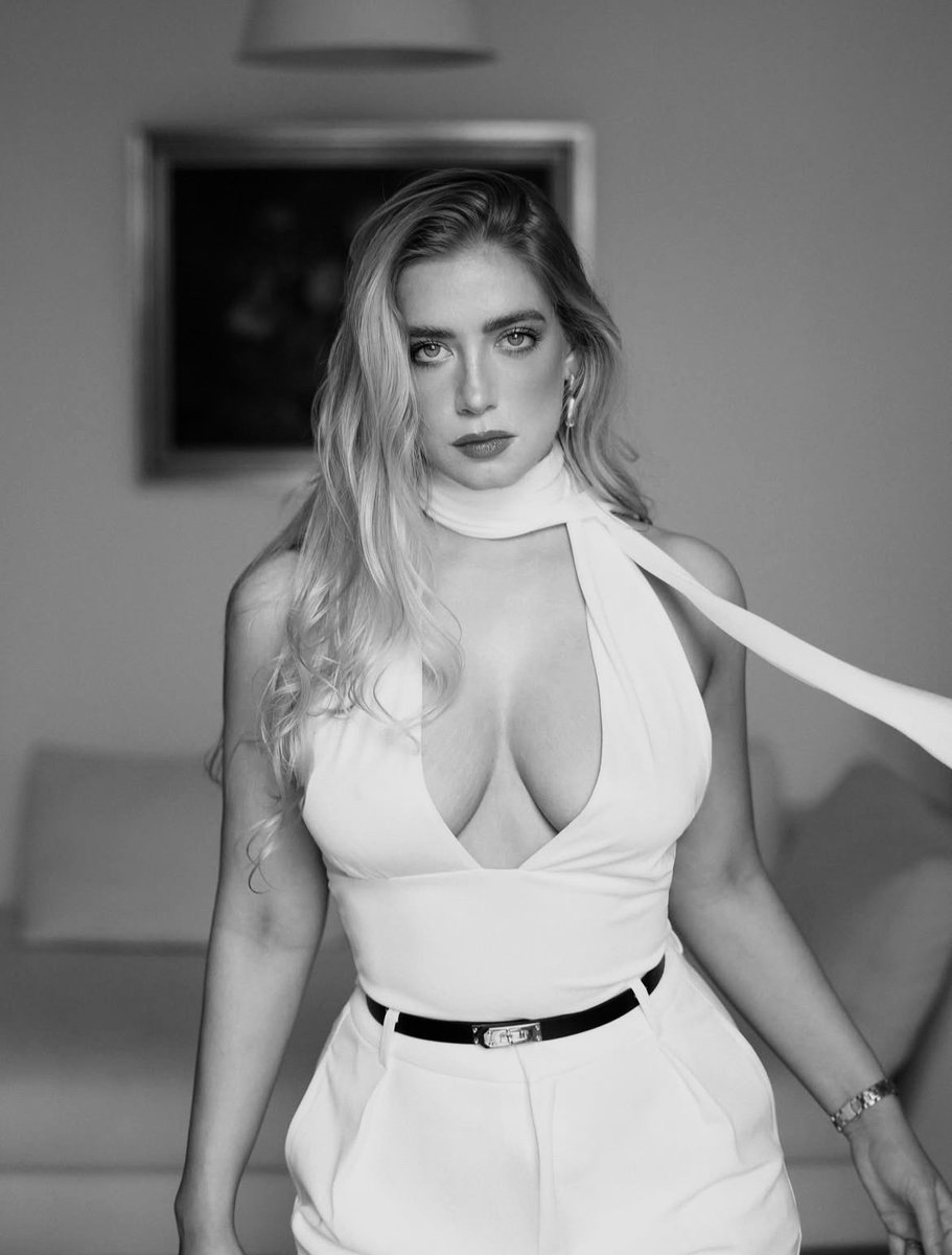 🔶️The Whisper of the Unspoken🔶️

- There is a stillness at the heart of every storm, a whisper of power that does not need a voice. Here, motion becomes a backdrop to poise, a soft frame for a gaze that holds the weight of its own truth...

⛓️🔻