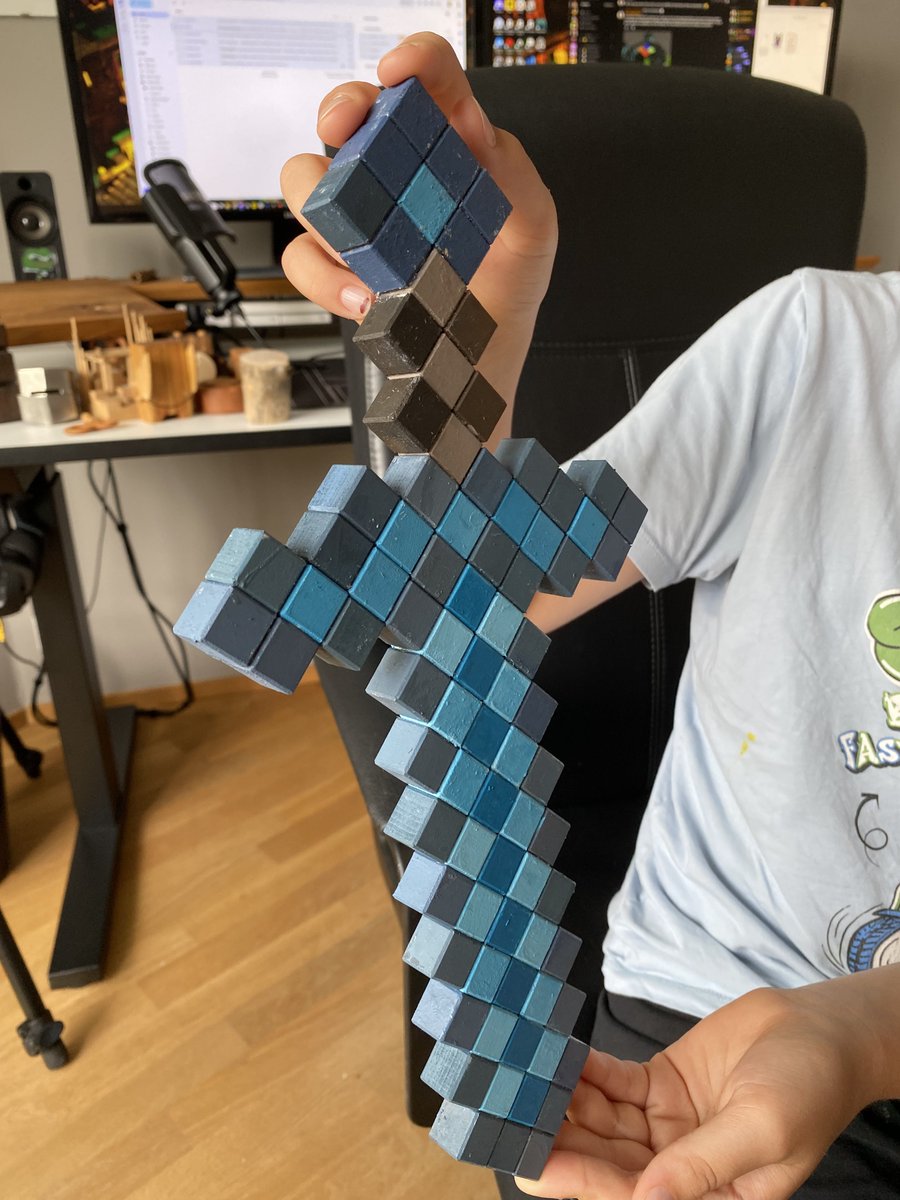 voxelgem's tweet photo. My older one is super happy how his  handcrafted Minecraft sword turned out! ⚔️ Proud to see him crafting with real-life voxels. 😊

I still have a few hundreds wooden cubes in stock so larger projects are up next. 😄 

#Minecraft #minecraftcrafts #handcrafted #woodtoy #voxelart https://t.co/UAJqs1zc0G