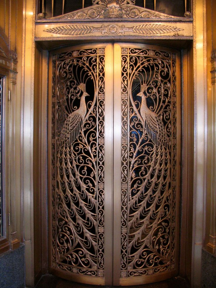 Bronze peacock doors in the Art Nouveau style