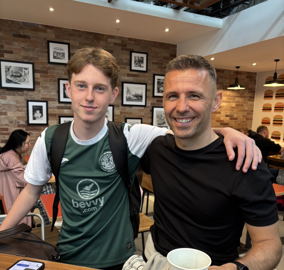 EDI_Airport's tweet photo. ⚽️ | A few football fans kicking about the terminal today! 

We’ve got @HibernianFC fans heading out to Poland for tomorrow night’s second leg against Legia Warszawa. https://t.co/YiRmr4eauR