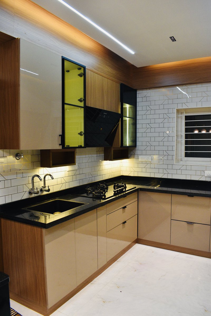 olangana_design's tweet image. The kitchen has always been the heart of every home — and designing it is something truly special. ☕🤎
This coffee brown beauty, complete with a cozy breakfast counter, was thoughtfully designed and executed by Olangana. 
Every corner is maximized for smart storage.