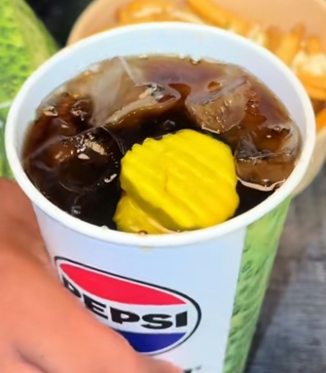 Dexerto's tweet image. KFC has launched a Pickle Pepsi in Canada

It’s part of a new pickle-filled menu with a chicken sandwich, fried pickles, and loaded fries