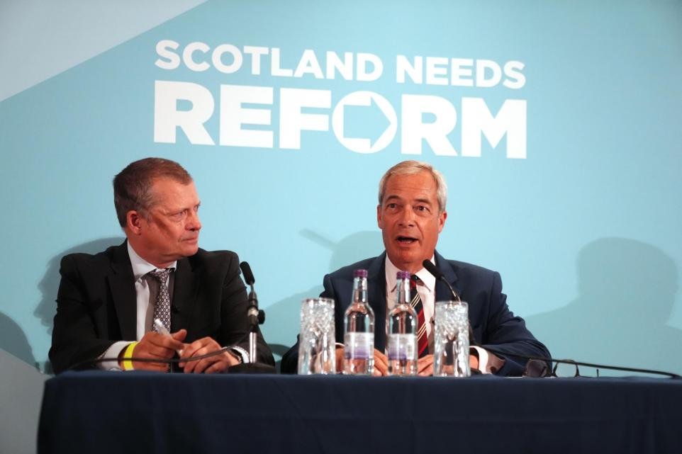 HOLYROOD

Tory MSP defects to Reform

Tory MSP, carpetbagger and opportunist, Graham Simpson, (pictured with Farage) sensing Tory politicians are about to be expunged from Scotland, has defected to fascist Farage's Reform-UKip party.

At a press conference in salubrious
