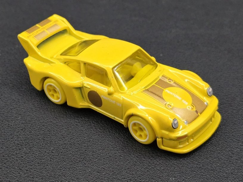 Hot Wheels Porsche 934.5 - Pantone 123. 123 is the yellow color