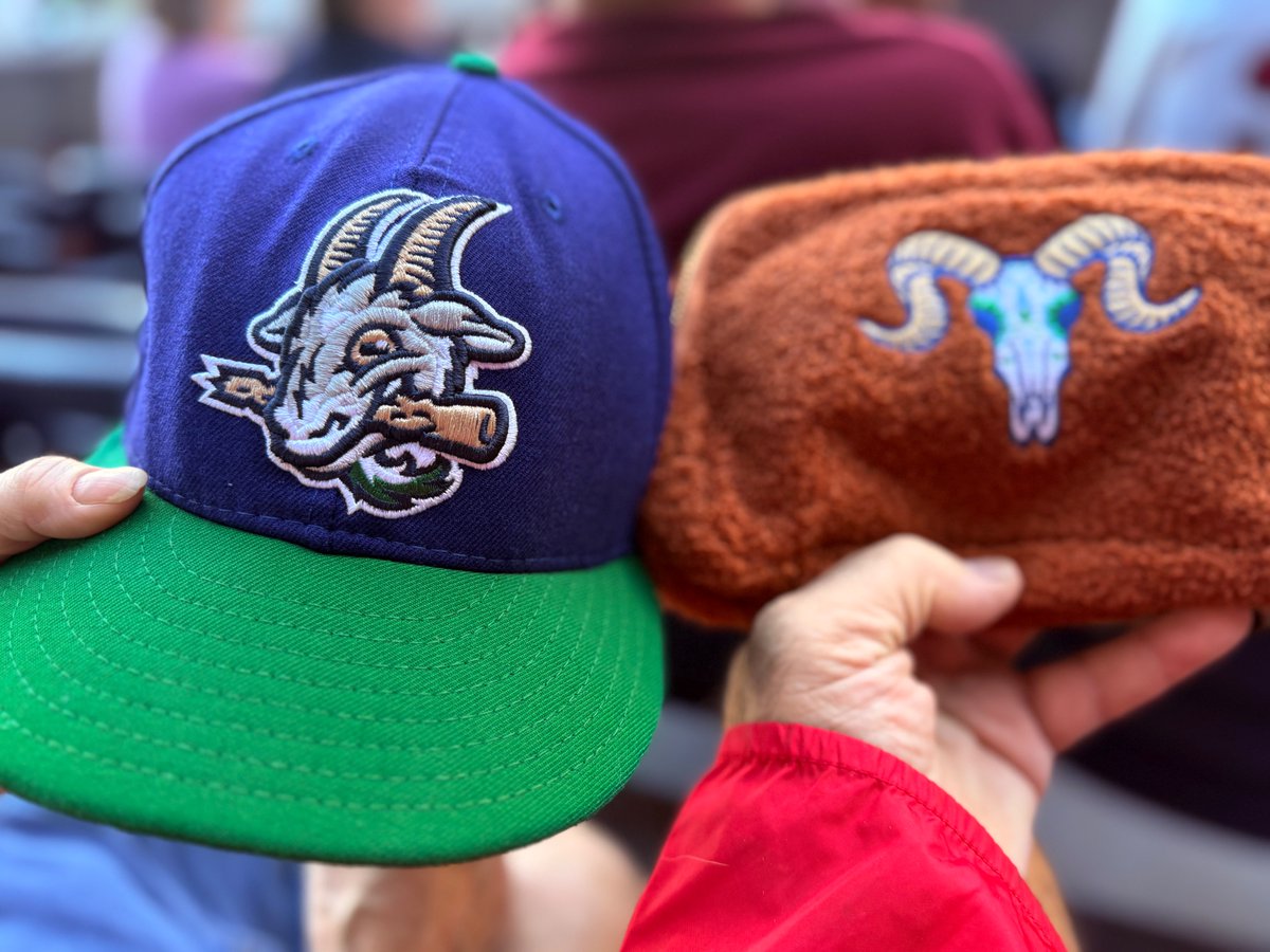 bobmule's tweet image. Enjoyed seeing the #Yardgoats last night at Dunkin' Park but we're still trying to figure out the logo on the fuzzy fanny pack giveaway.