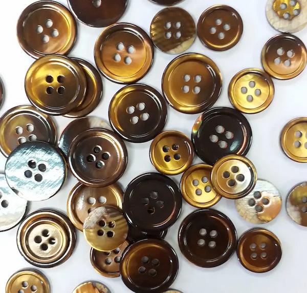 ywbutton's tweet image. Brilliant vivid 12 colors of Dyed Pearl Suit Buttons Sizes 24L for sleeves and 32L for body of suit.
Available in dozen or gross, shop now while stock lasts at zurl.co/YygnU