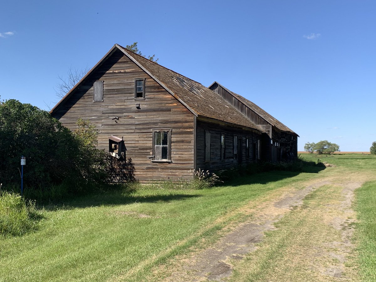 Housebarns we visited this week near Swift Current. Preservation of historic buildings, such as these Mennonite housebarns, is a major theme of my novel Once Removed, so it was great to see several examples still in existence in Saskatchewan.