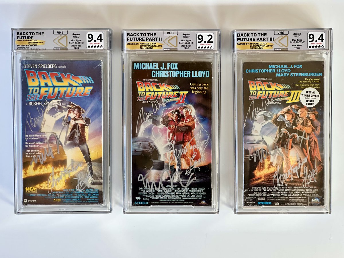Comics & Crypto (@comicsandcrypto) on Twitter photo Great Scott! Our signed <a href="/BacktotheFuture/">Back to the Future™</a> VHS tapes have arrived! 🌩️🕰️
Sealed BTTF 1, 2 & 3, each <a href="/RewindGrading/">Rewind Grading</a> and signed by the legendary trio: Michael J. Fox, Christopher Lloyd & Thomas F. Wilson
A true time-traveling grail for collectors. 🚗🔥 Great Scott! Our signed <a href="/BacktotheFuture/">Back to the Future™</a> VHS tapes have arrived! 🌩️🕰️
Sealed BTTF 1, 2 & 3, each <a href="/RewindGrading/">Rewind Grading</a> and signed by the legendary trio: Michael J. Fox, Christopher Lloyd & Thomas F. Wilson
A true time-traveling grail for collectors. 🚗🔥
