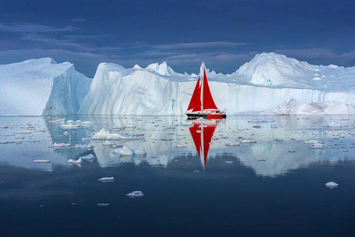 Perfect mirror during blue hour in Disko Bay last month in Greenland.