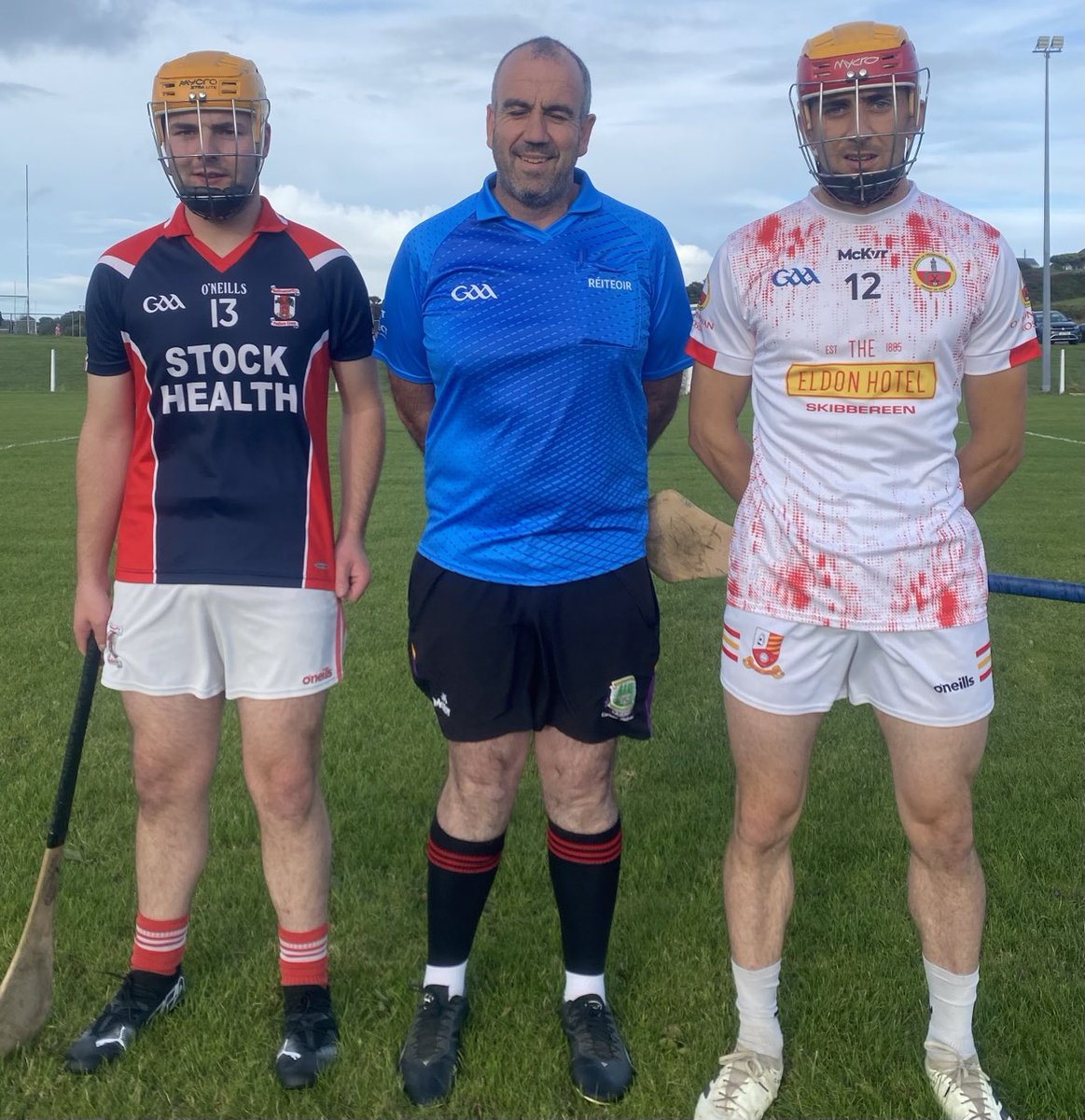 Team captains Timothy Lucey &amp; Michael O’Donovan with referee James Kingston at JBH Ballinascarthy v O’Donovan Rossa