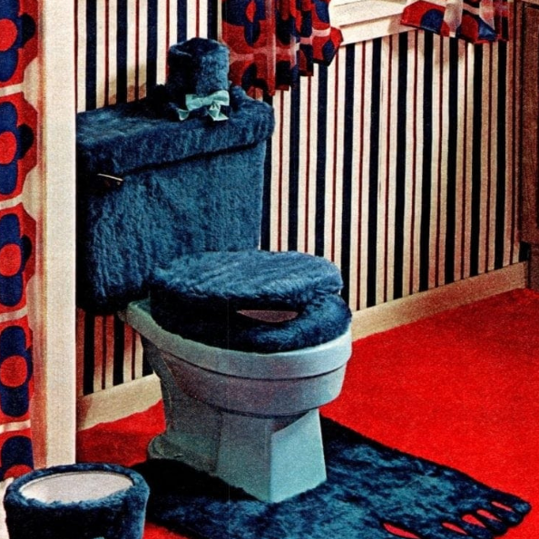 The bathroom styles of yesteryear are absolutely WILD.

While it’s soft to touch and comes in a variety of colors, all we can think of is how bright these toilet cozies must shine under a black light 🤢

Show of hands, who has ever dressed up their toilet? 🙋‍♂️ 🙋