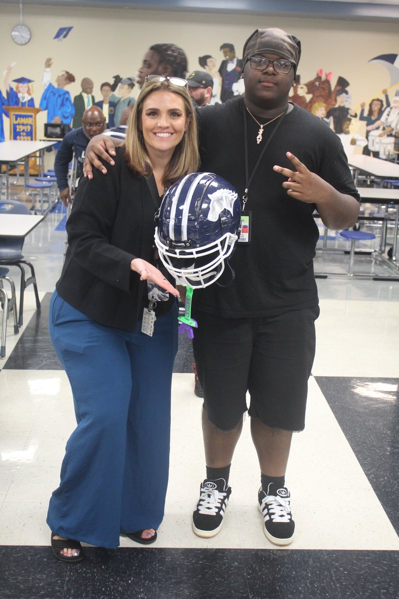 Just a few days ahead of the <a href="/LCHS_Mustangs/">Lamar Consolidated Athletics</a> varsity football regular season opener, the players took part in the inaugural "Decals with Teachers" event. LCHS staff &amp; faculty came out to bond &amp; help the players put the decals on the players' helmets. <a href="/THELamarCHS/">Lamar Consolidated High School</a>