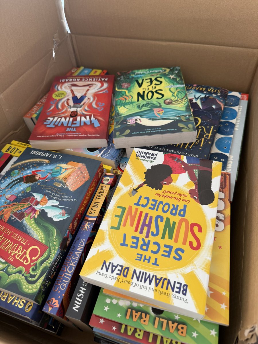 Perks of starting at a brand new school? Boxes on boxes of brand new books. I am in book heaven. 📚😍