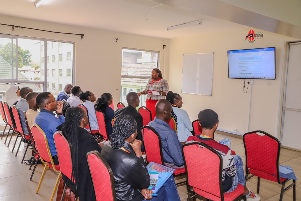 NCIC_Kenya's tweet photo. NCIC’s Ms. Millicent Okatch presented on Gender Dynamics, Dangerous Speech & Violent Extremism at the National Interfaith PCVE Summit 2025 in Nairobi, themed “Building Resilient Communities Against Violent Extremism.”

In partnership with @KOICAKenya, @UNDPKenya,@irck_info & @NCTC_Kenya, the summit united stakeholders for peace & cohesion. NCIC also led breakaway sessions on Peace, Social Cohesion & Inclusion.

#PCVESummit2025 #amanikwaground #peacebuilding