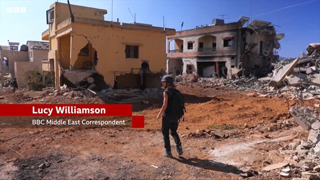 مصدر عام | The Public Source (@thepublicsource) on Twitter photo BBC’s Lucy Williamson (<a href="/LucyWilliamson/">Lucy Williamson</a>), clad in helmet & vest, amid the ruins of Lebanese homes.
“Wow… wow,” she said, adding that Hezbollah was “well-prepared & well-armed.” She didn’t mention Israel’s illegal invasion, the civilian death toll, or multiple previous invasions. BBC’s Lucy Williamson (<a href="/LucyWilliamson/">Lucy Williamson</a>), clad in helmet & vest, amid the ruins of Lebanese homes.
“Wow… wow,” she said, adding that Hezbollah was “well-prepared & well-armed.” She didn’t mention Israel’s illegal invasion, the civilian death toll, or multiple previous invasions.