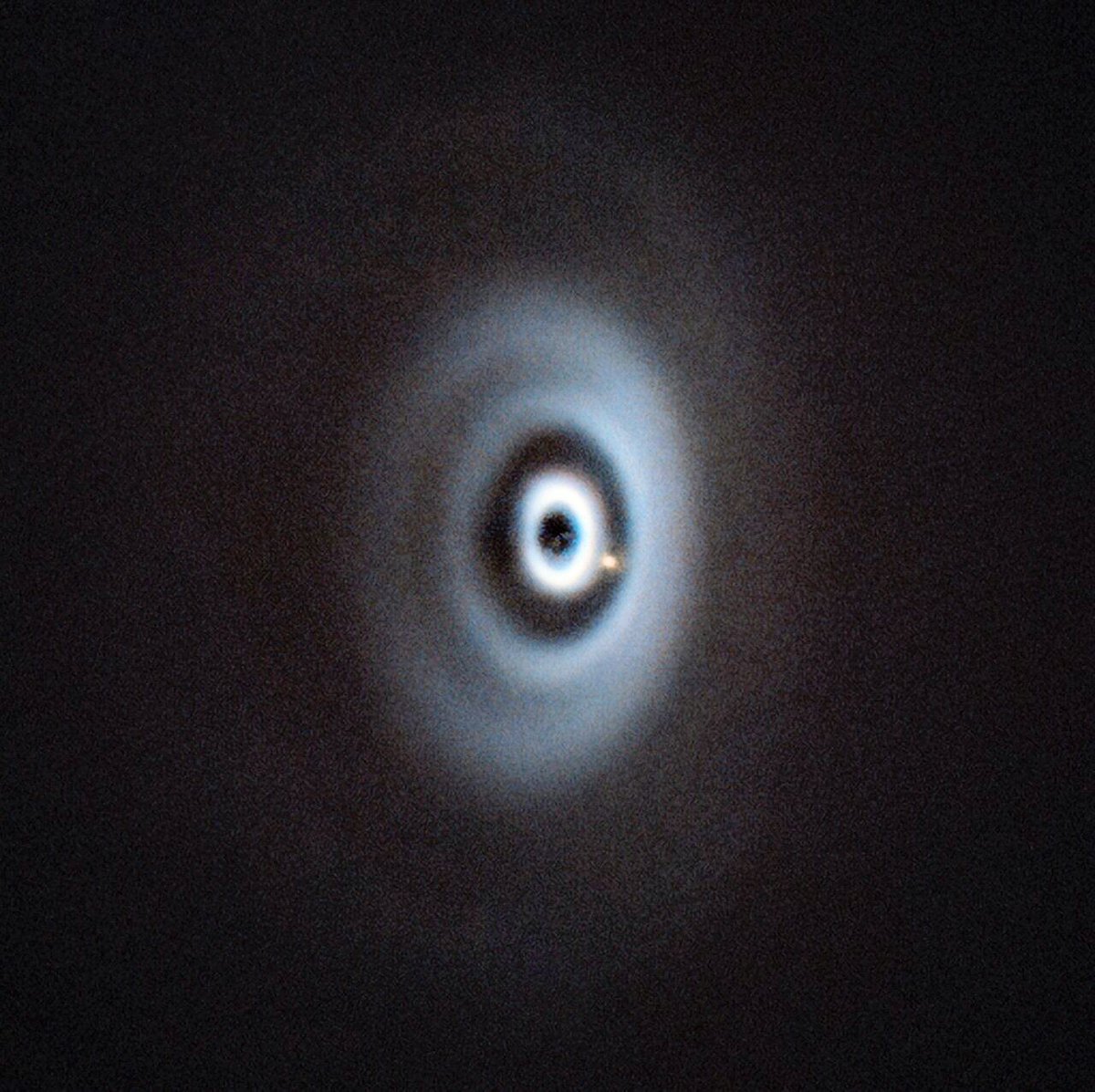 Remarkable image of a 9x Jupiter size "baby" planet, forming from the  protoplanetary disc around star WISPIT. Thought to be only around 5 million years old. An infrared image by ESO’s Very Large Telescope (VLT) in Chile highlights the gas/dust and the glowing planet.
Credit: ESO