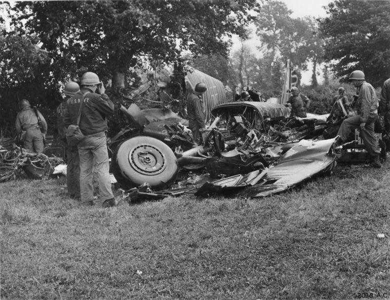 Americans inspect a German bomber Ju-88 (Junkers Ju 88) shot down over the Normandy beachhead. 1944