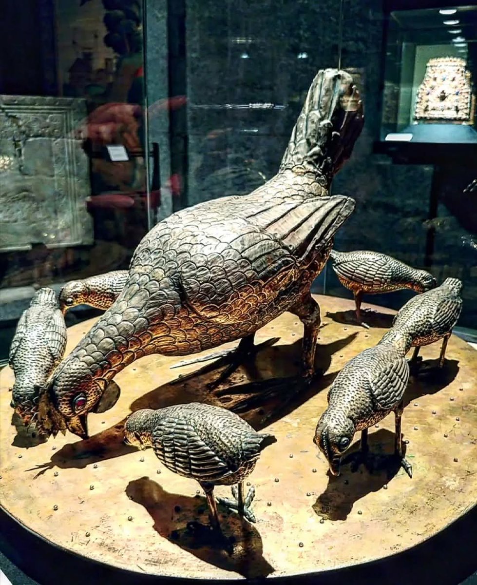 A curious piece of very valuable Lombard art present in the treasure of Theodelinda is the "Chicken with the chicks".

Dating probably to 6th Century AD, the work represents a chicken intent on pecking, with its chicks, the latter added later. The figures are made of gilded