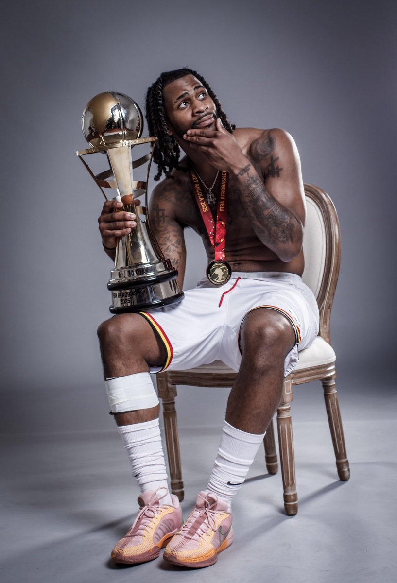 Terrapins247's tweet image. Bruno Fernando and Selton Miguel pose with the trophy after helping Angola win the 2025 FIBA AfroBasket. 

📸: (AfroBasket/X)