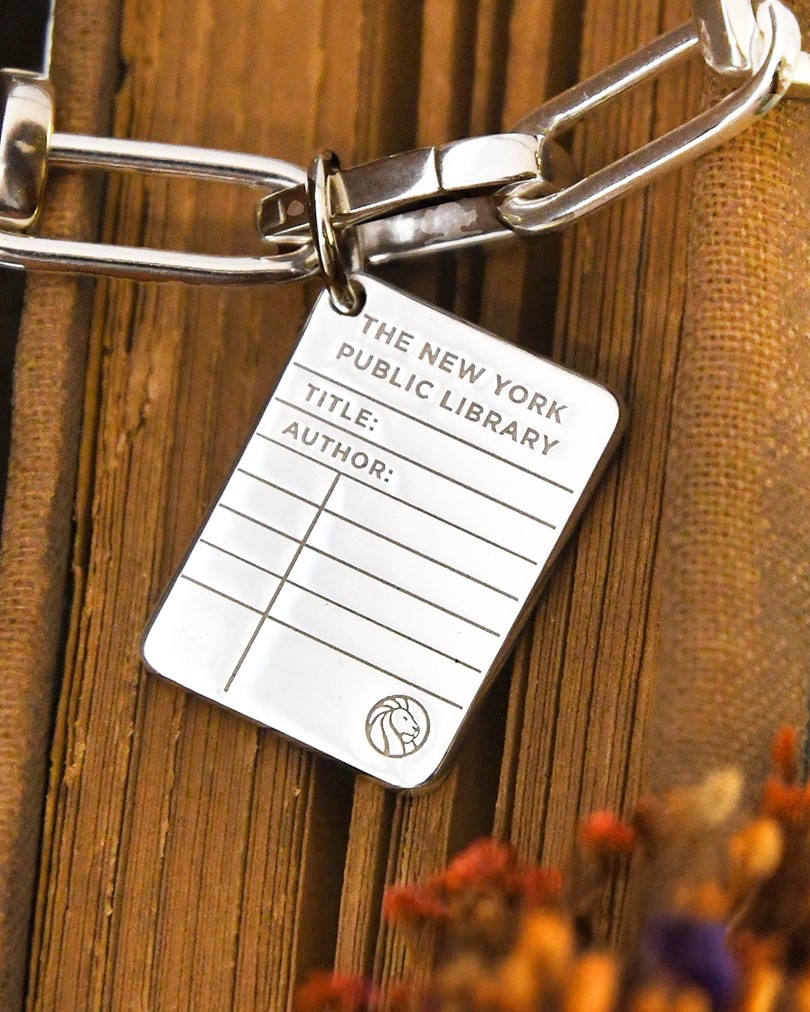 nyplshop's tweet image. A library card as a charm? Yes, please! You need a little treat 😉 #LibraryCardSignUpMonth on.nypl.org/47ivkDB