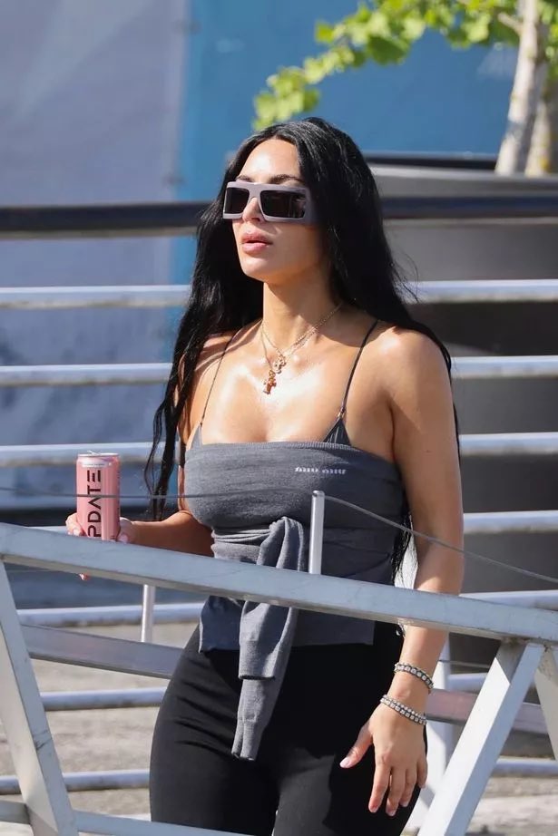 Note the UPDATE drink product placement: she did it leaving Venice after the Bezos wedding this summer, and then repeated the exact same placement when arriving for the Venice film festival today. hashtag AD