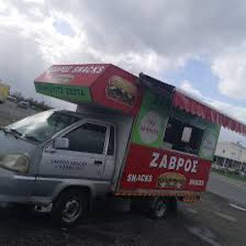 SteliosC's tweet photo. Hey @DocRivers! Definitely suggesting a mixed sandwich with sausage and pickles from Zavros-Snacks Van 🚐right outside the stadium 🏟️. You will thank me later. 🥪 🇨🇾 #EuroBasket #EuroBasket2025 https://t.co/R2shPwBin9