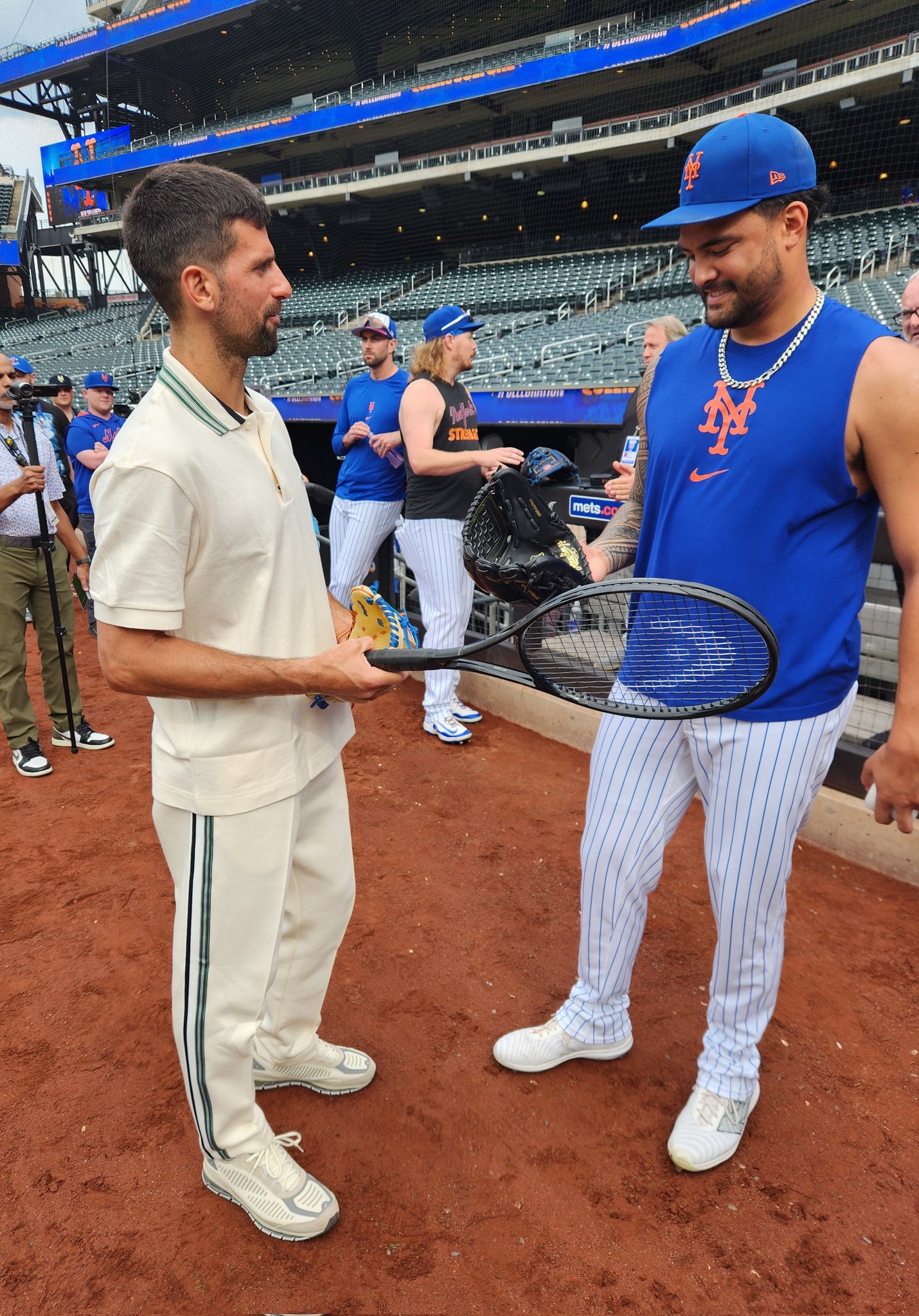 GzdxjxxWsAAl5g6?format=jpg&name=large Novak Djokovic Shocks Fans by Breaking Down Baseball Pitching vs. Tennis Swing in Street-Side Chat with Star Sean Manaea