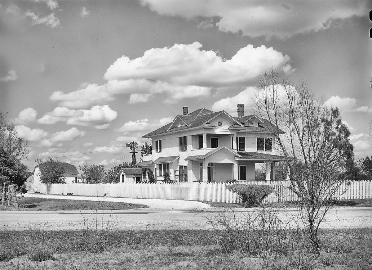Russell Lee took this photo of a gorgeous house in rural San Patricio county in 1940. Russell's notes indicate that "this is a house owned by people who work in town (probably Sinton, I'm guessing) but live in the country."  It's like a postcard dream of a house, something you'd