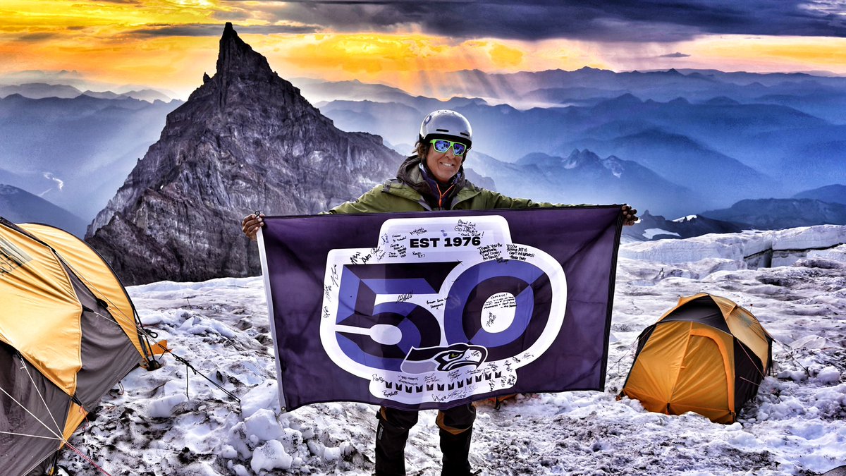 My son Gianni and I attempted to summit Mt. Rainier until the trail collapsed. We made it to 12,000 of 14,000 feet—so close but so far. I want to thank all the @seahawks players who autographed this at training camp. I thought of you every step and sometimes one quarter step OTW.